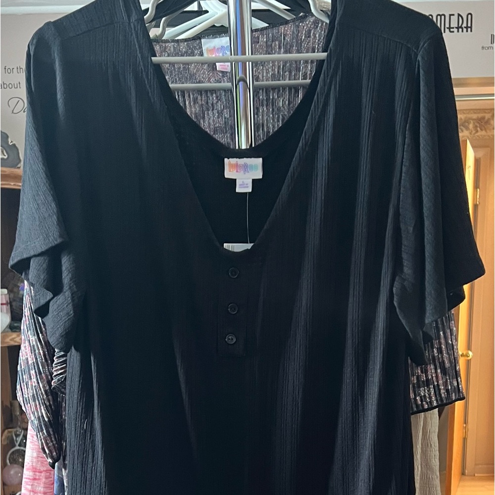 LuLaRoe Xanthe romper.  Black.  Brand new with tags.  Size L